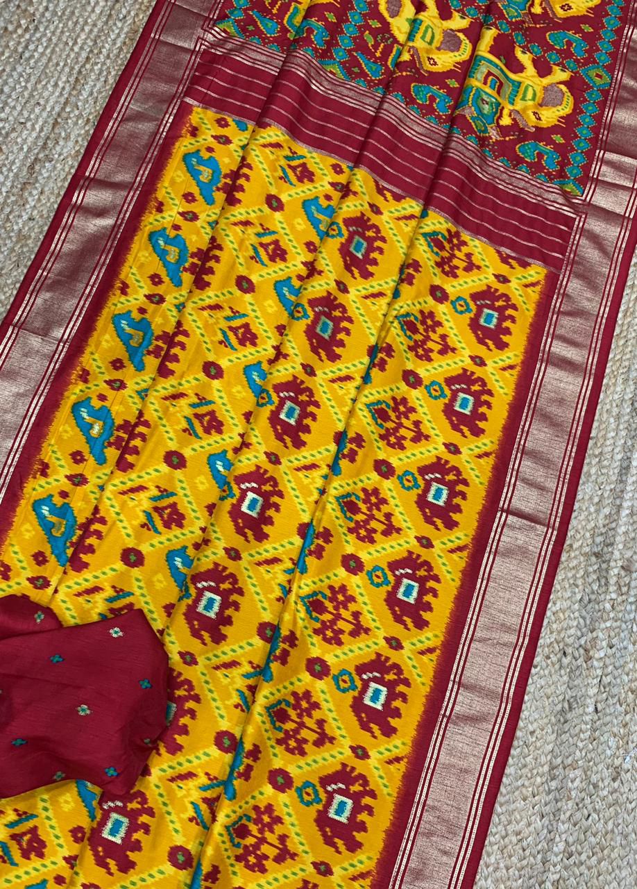 White And Red Patola Silk Saree