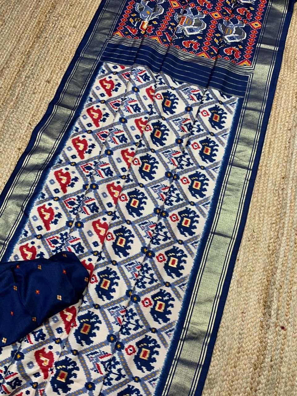 White And Red Patola Silk Saree